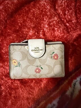 COACH Beige Signature Floral Compact Wallet with Cream Trim